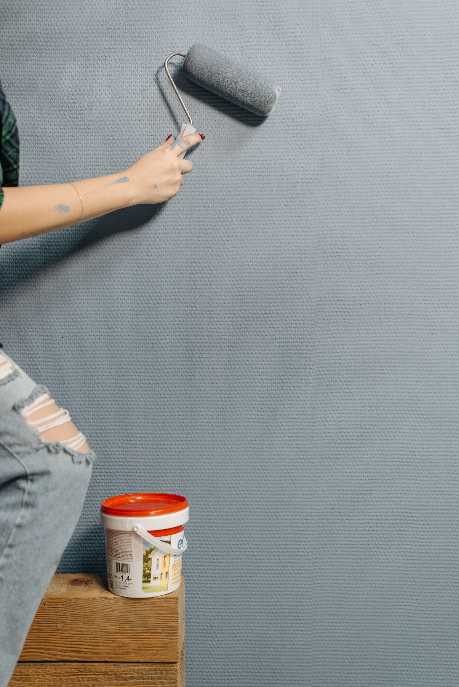 Painting an interior wall with a roller